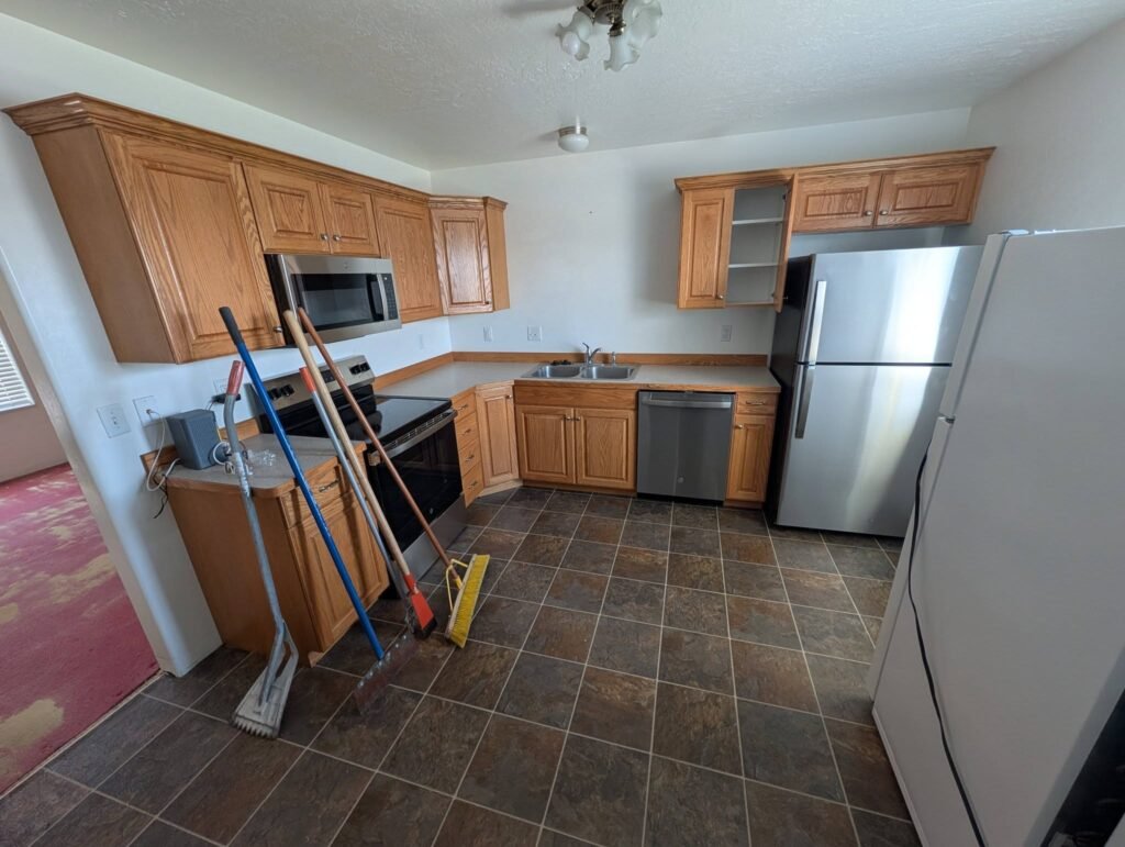 Kitchen before an investment property renovation by The Nelsons Crew in Brigham City, Utah