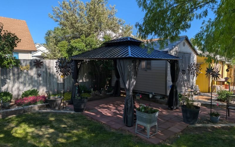 Completed backyard gazebo and landscaping project by The Nelsons Crew